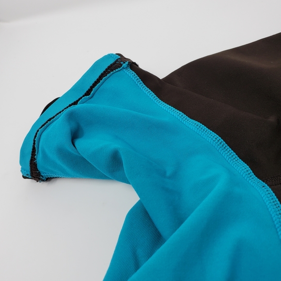O'NEILL BROWN AND TEAL SHORT SLEEVE RASH GUARD SIZE SMALL - Picture 12 of 12